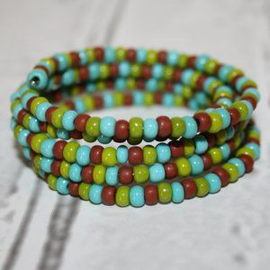 Brown, green and blue glass beaded coil bracelet